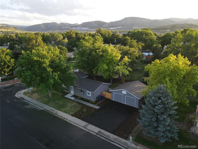 a view of a mountain with a mountain in the background