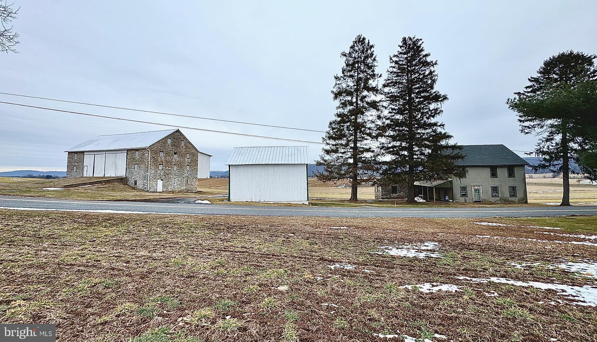 133 Hunter Road Oley, PA 19547 - Photo 29 of 29 a front view of a house with garden