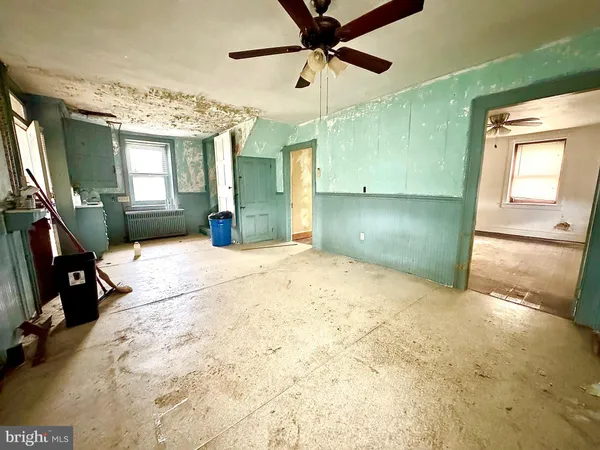 a view of a livingroom with a fireplace and furniture