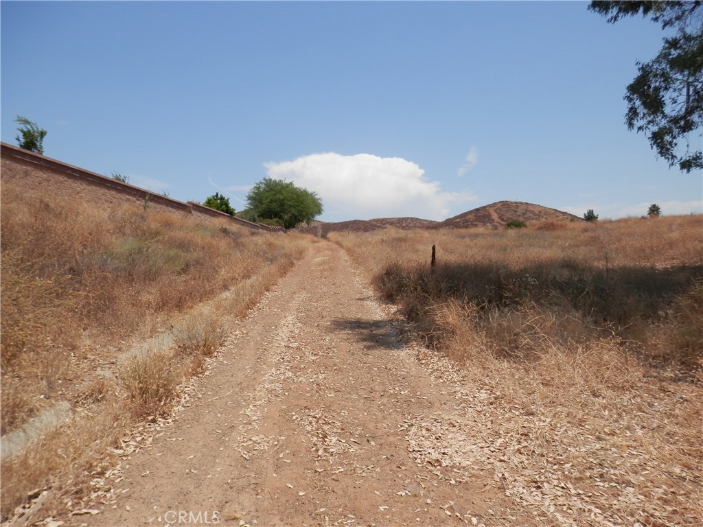 A Hemlock Street Wildomar, CA 92584 - Photo 4 of 15 a view of a dry field