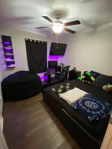 a kitchen with stainless steel appliances granite countertop a sink dishwasher and a black countertop