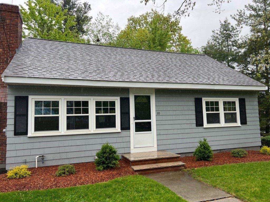 30 Arbor Road Chelmsford, MA 01863 - Photo 2 of 32 a view of a house with a yard