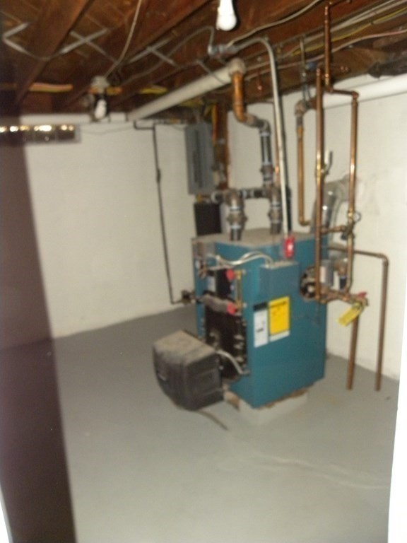 30 Arbor Road Chelmsford, MA 01863 - Photo 29 of 32 a room with musical instruments