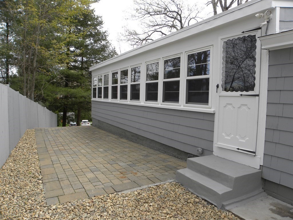 30 Arbor Road Chelmsford, MA 01863 - Photo 4 of 32 a view of house with yard