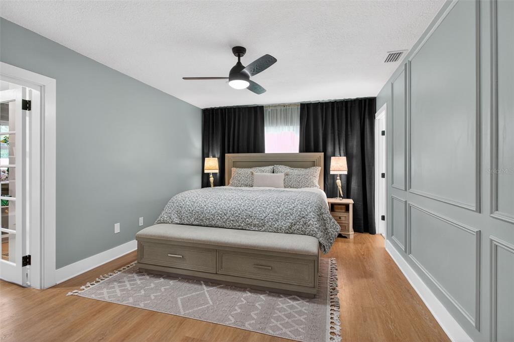 1714 Indian Rocks Road Belleair, FL 33756 - Photo 29 of 62 a bedroom with a large bed and a window