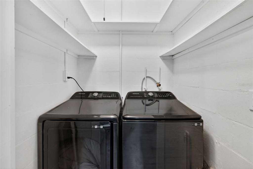 1714 Indian Rocks Road Belleair, FL 33756 - Photo 39 of 62 a utility room with dryer and washer