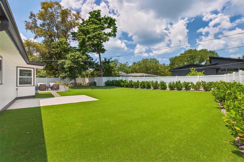 1714 Indian Rocks Road Belleair, FL 33756 - Photo 47 of 62 a view of a house with a big yard