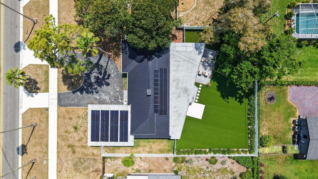 1714 Indian Rocks Road Belleair, FL 33756 - Photo 51 of 62 a view of a house with a backyard