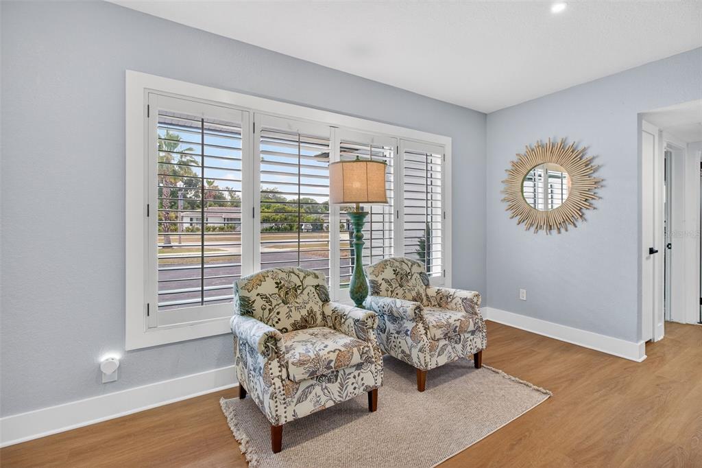 1714 Indian Rocks Road Belleair, FL 33756 - Photo 6 of 62 a living room with furniture and a window