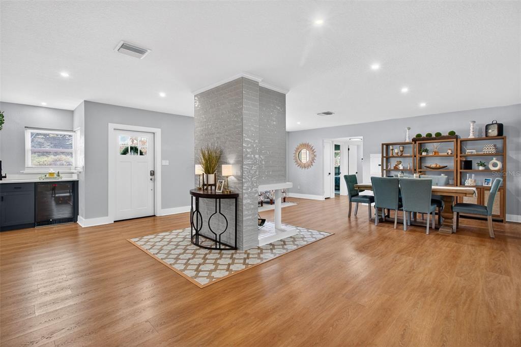 1714 Indian Rocks Road Belleair, FL 33756 - Photo 9 of 62 a view of a dining room with furniture and wooden floor