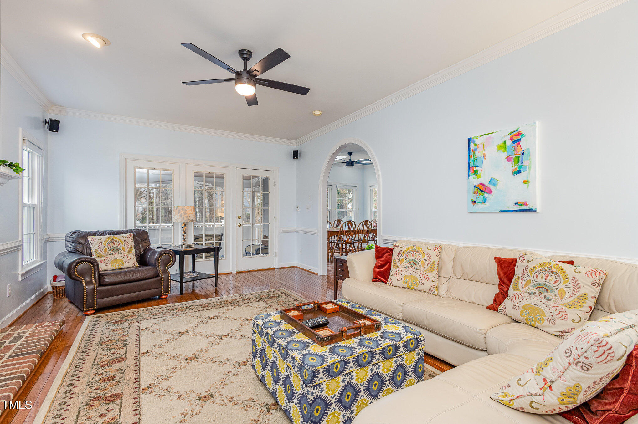 2719 Amstel Way Raleigh, NC 27613 - Photo 13 of 41 a living room with furniture and a rug
