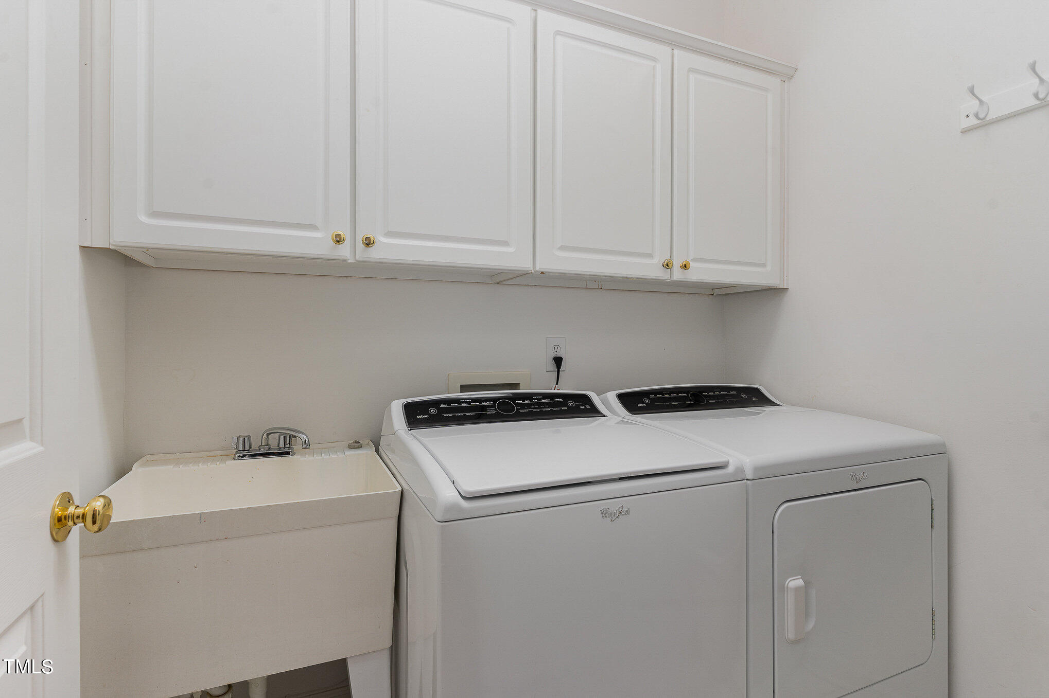 2719 Amstel Way Raleigh, NC 27613 - Photo 26 of 41 a utility room with dryer and washer
