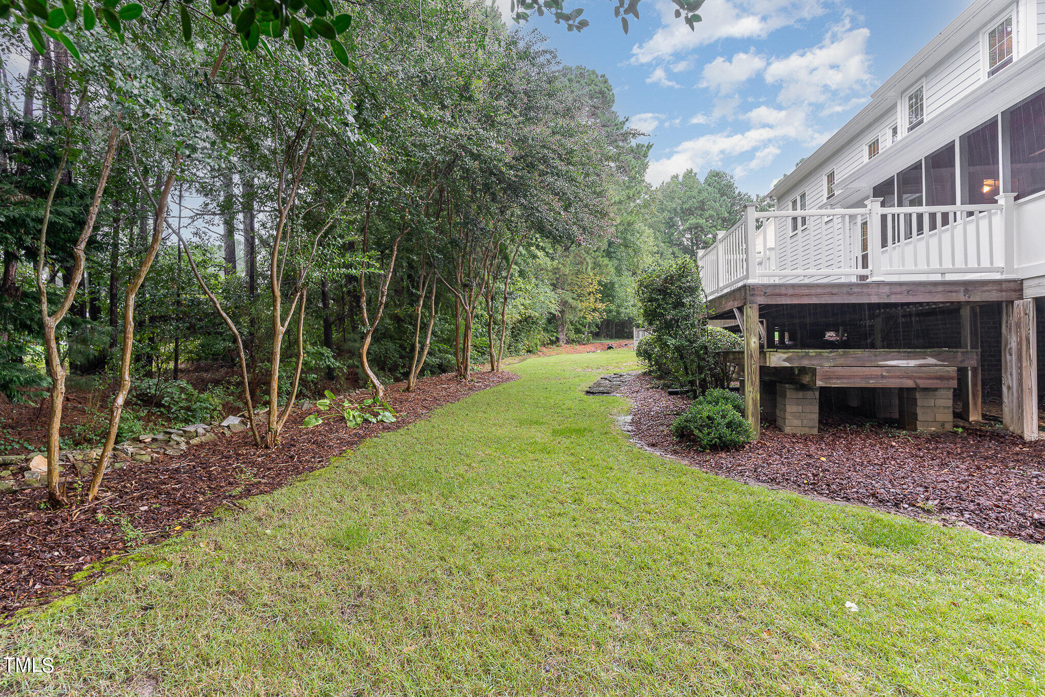 2719 Amstel Way Raleigh, NC 27613 - Photo 31 of 41 a view of house with backyard and trees