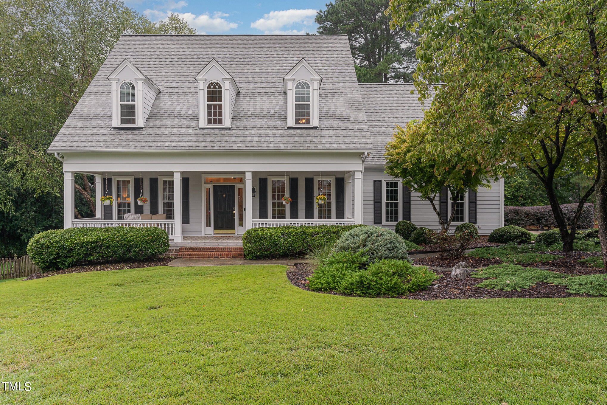 2719 Amstel Way Raleigh, NC 27613 - Photo 3 of 41 a front view of a house with a garden