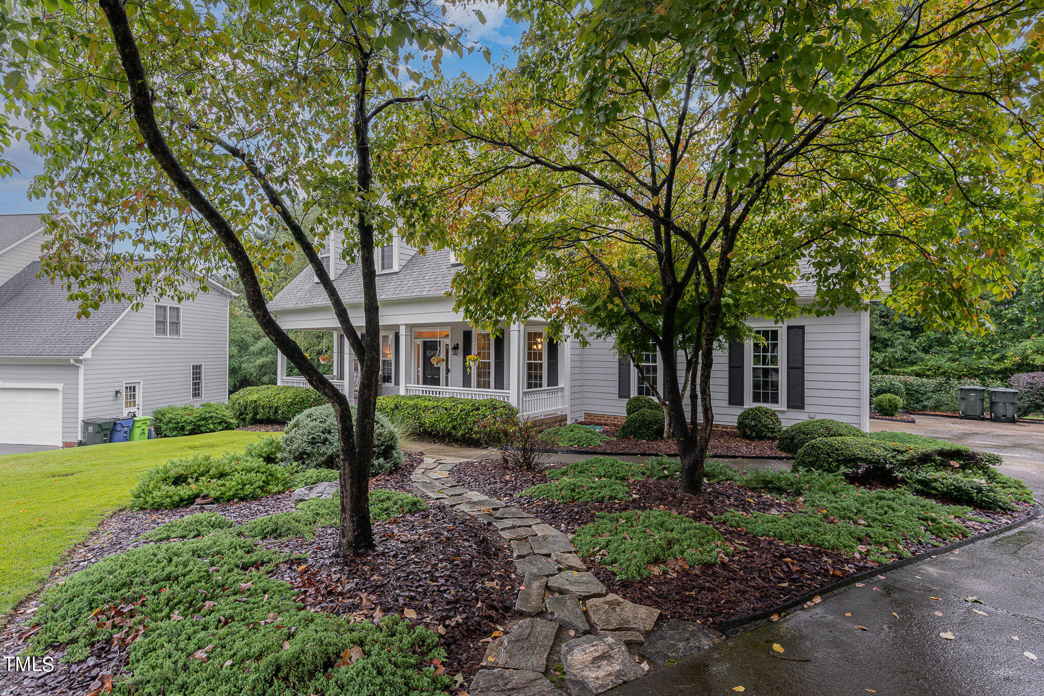 2719 Amstel Way Raleigh, NC 27613 - Photo 4 of 41 a view of a big yard with plants and large trees