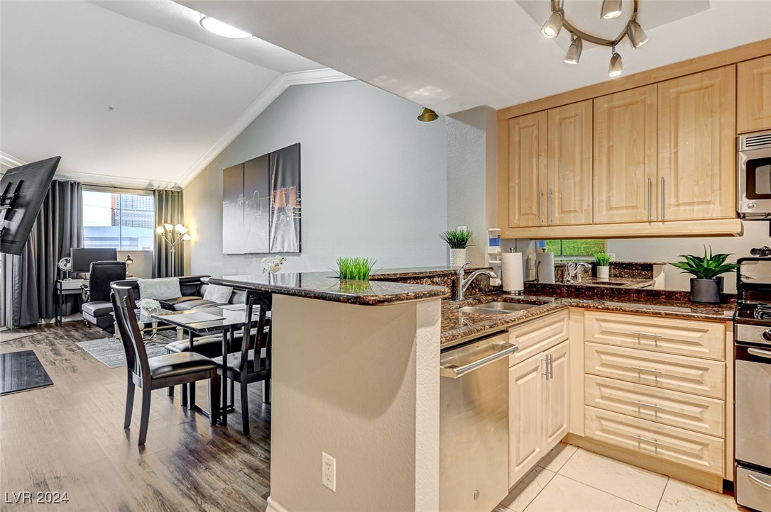 210 East Flamingo Road, Unit 413 Las Vegas, NV 89169 - Photo 12 of 72 Kitchen Open to the Living Room
