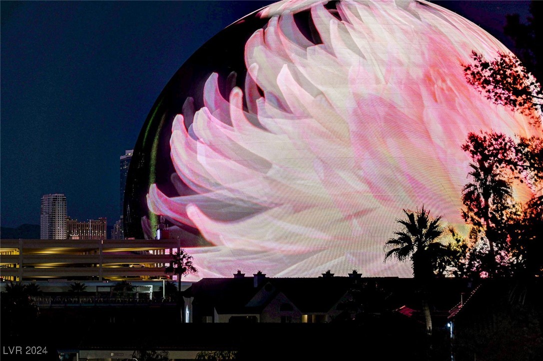 210 East Flamingo Road, Unit 413 Las Vegas, NV 89169 - Photo 4 of 72 The Sphere Illuminates the Sky at Night