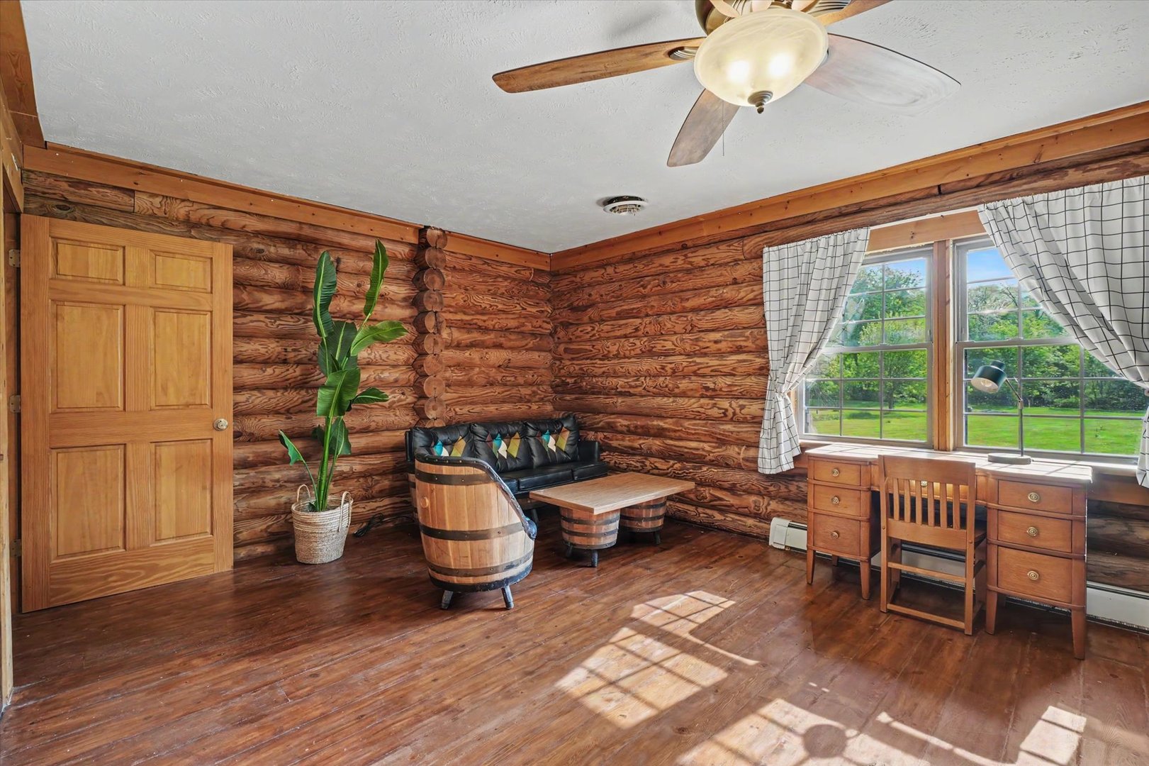 2431 North 1450 East Road Mansfield, IL 61854 - Photo 34 of 78 a reading room with furniture and wooden floor