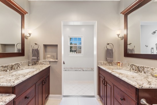 601 North Merrill Street Park Ridge, IL 60068 - Photo 13 of 27 a bathroom with a granite countertop sink and a mirror