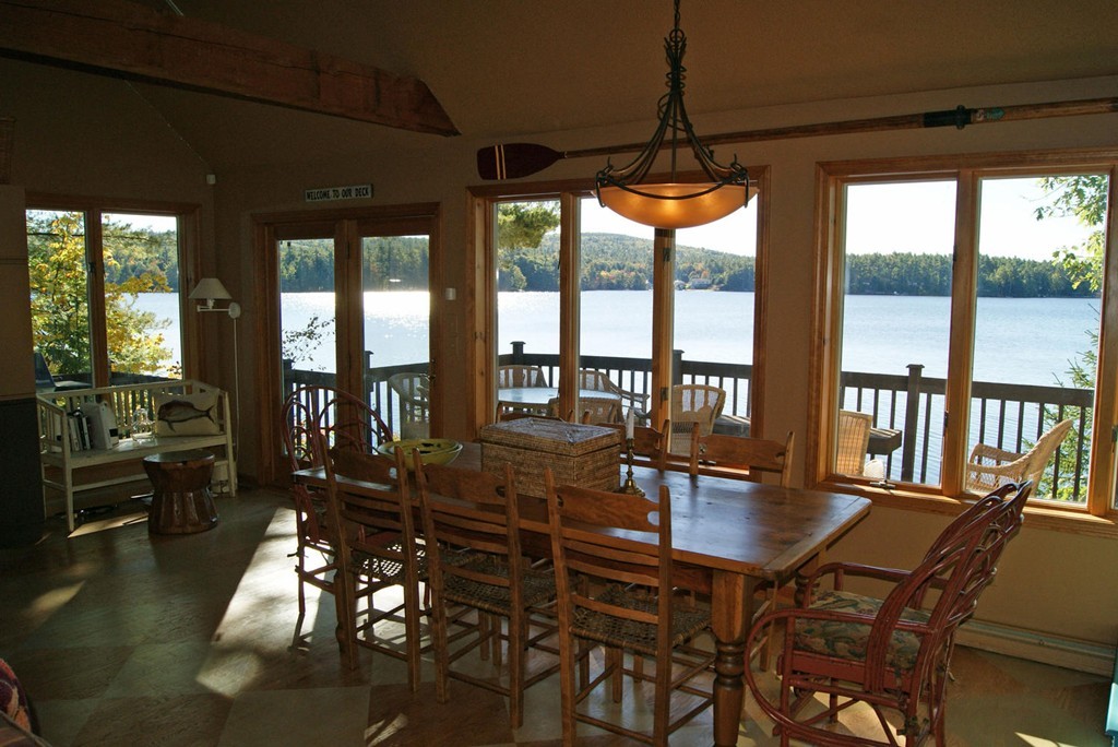 63 Conifer Road Rindge, NH 03461 - Photo 8 of 29 a view of a dining room with furniture window and outside view