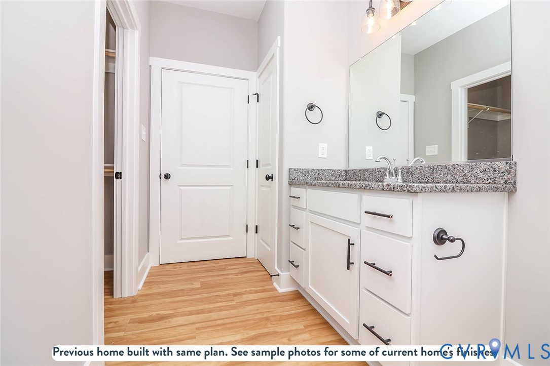 2794 South Constitution Route Dillwyn, VA 23936 - Photo 10 of 22 a bathroom with a sink and a mirror