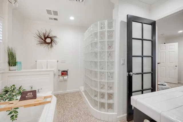 a room with lots of different colored cloths