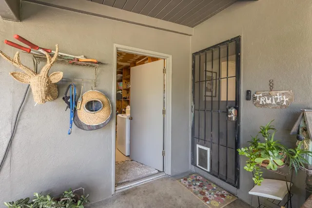 an aerial view of a house with yard swimming pool and outdoor seating