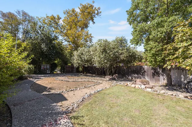 an aerial view of a house with outdoor space patio and entertaining space