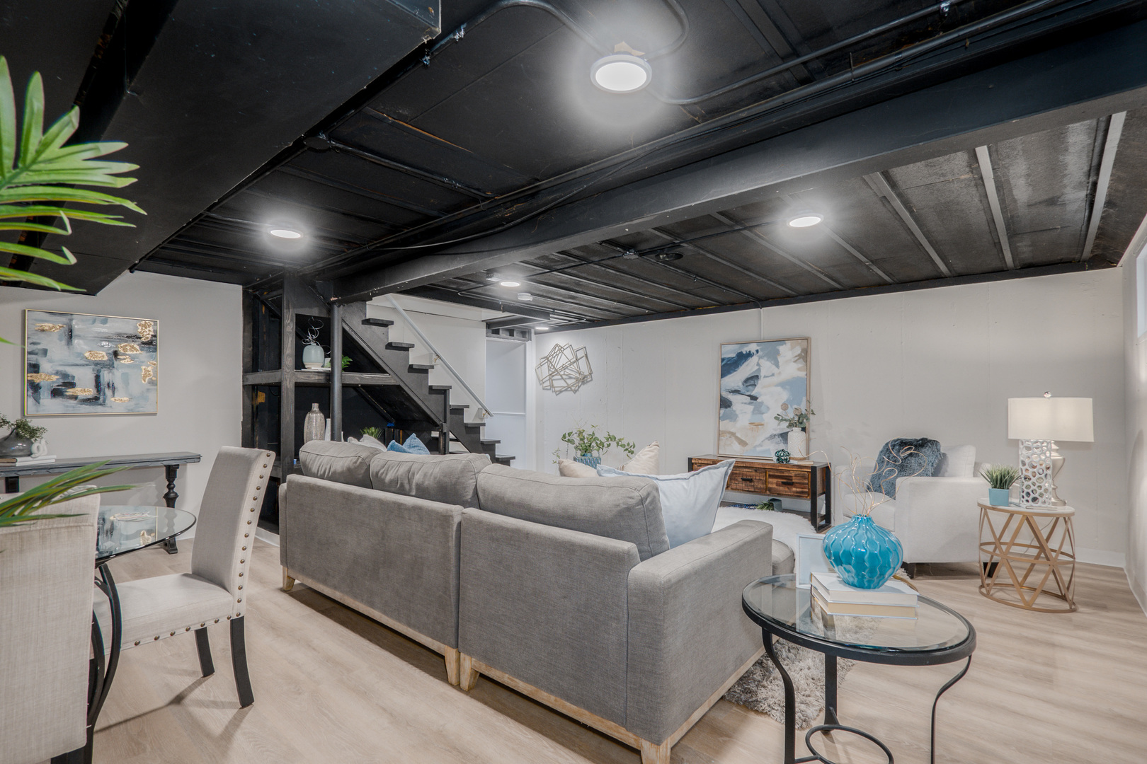 1936 South Street Geneva, IL 60134 - Photo 31 of 41 a living room with furniture and a chandelier