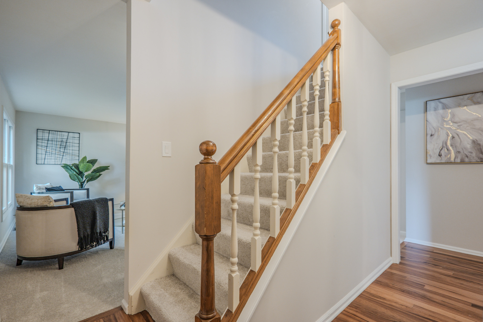 1936 South Street Geneva, IL 60134 - Photo 5 of 41 a view of an entryway with wooden floor and stairs