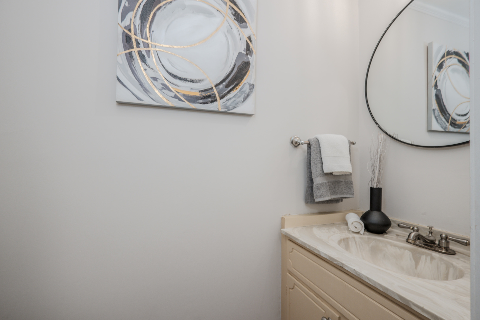 1936 South Street Geneva, IL 60134 - Photo 9 of 41 a bathroom with a sink and a mirror