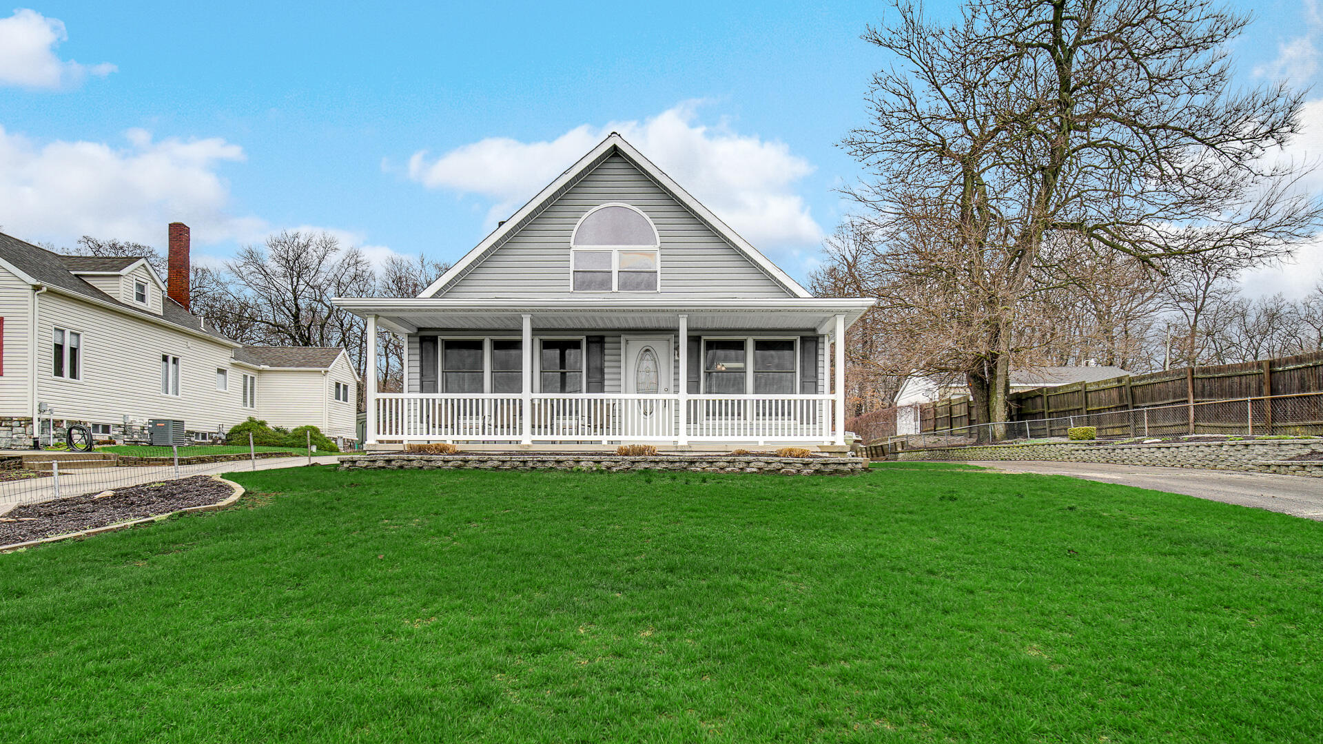4472 South County Road 210 Knox, IN 46534 - Photo 1 of 30 a front view of a house with a yard