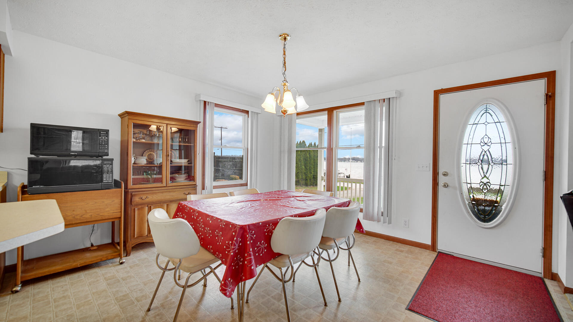 4472 South County Road 210 Knox, IN 46534 - Photo 12 of 30 a dining room with furniture window and outside view
