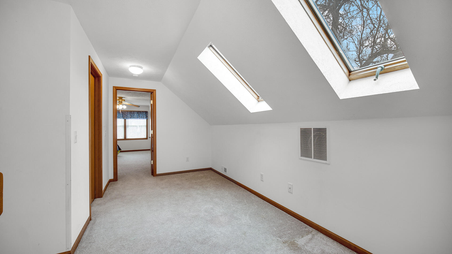 4472 South County Road 210 Knox, IN 46534 - Photo 24 of 30 an empty room with windows and closet