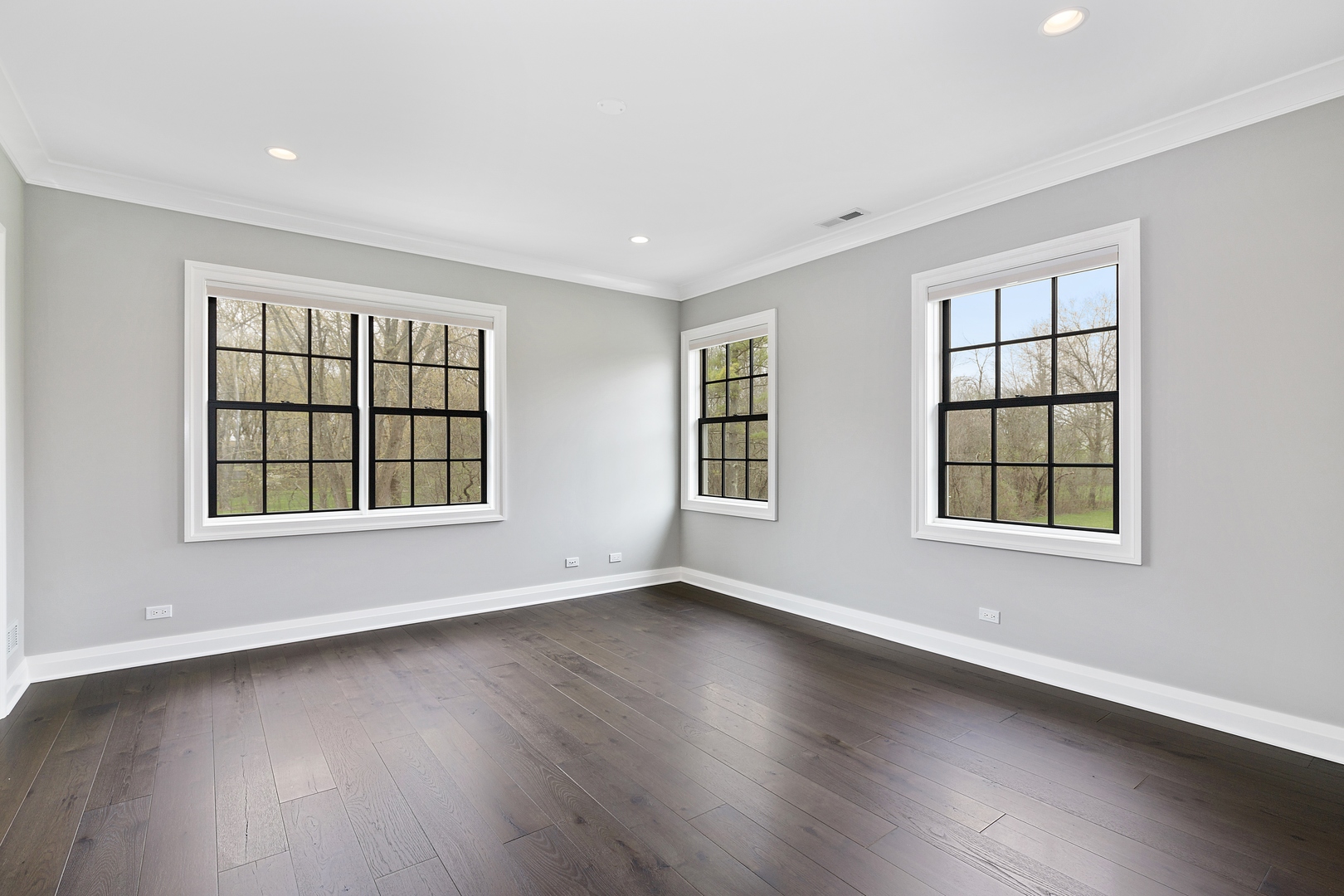 152 North Ridge Road Lake Forest, IL 60045 - Photo 19 of 23 a view of an empty room with a window and wooden floor