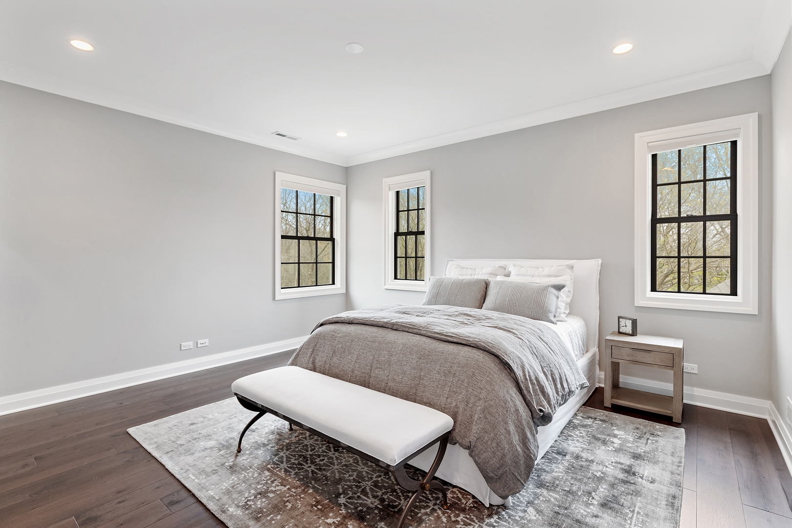 152 North Ridge Road Lake Forest, IL 60045 - Photo 20 of 23 a spacious bedroom with a bed and wooden floor