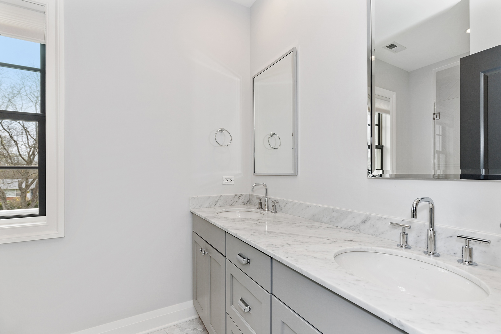 152 North Ridge Road Lake Forest, IL 60045 - Photo 21 of 23 a bathroom with a granite countertop sink and a mirror