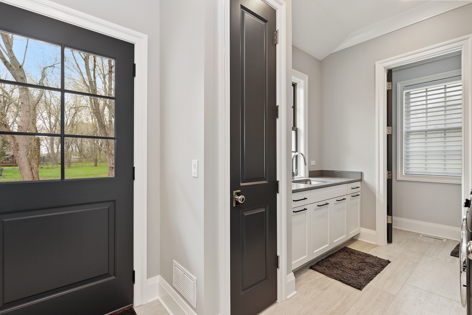 152 North Ridge Road Lake Forest, IL 60045 - Photo 23 of 23 a kitchen with white cabinets and a stove top oven