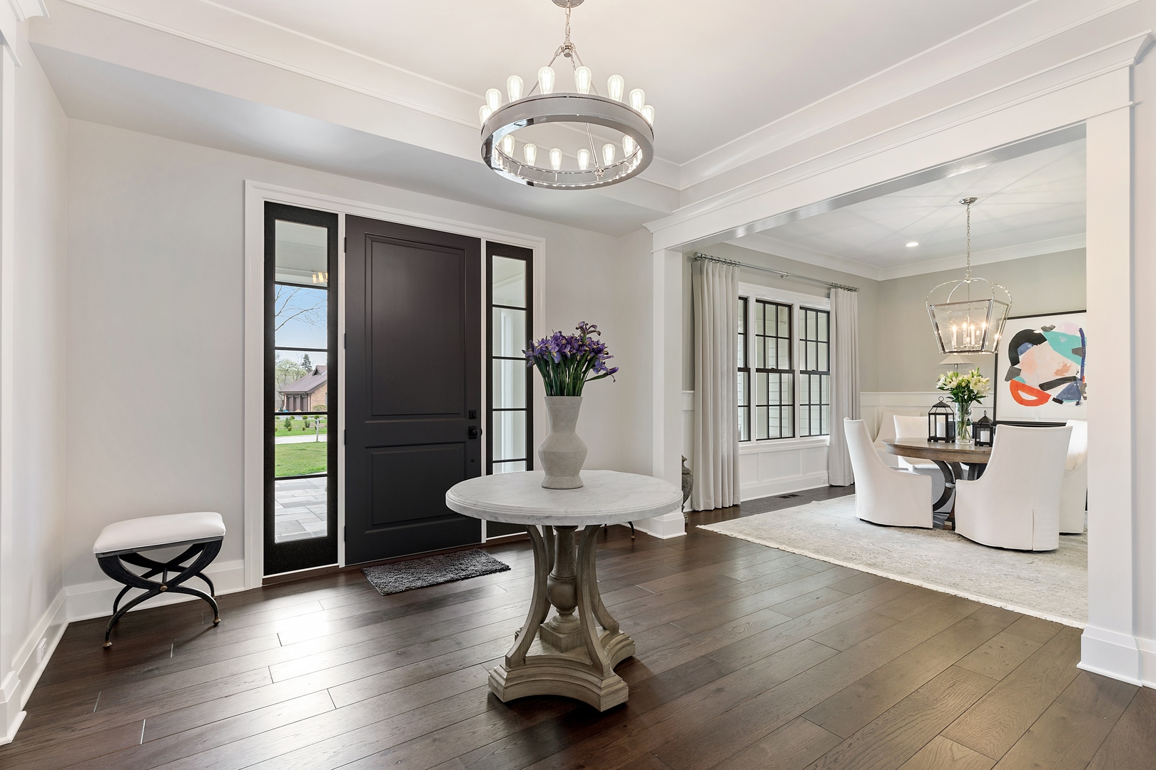 152 North Ridge Road Lake Forest, IL 60045 - Photo 4 of 23 a living room with furniture and a chandelier