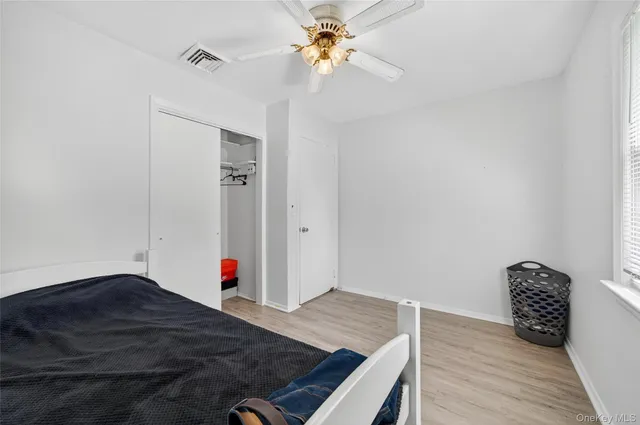 a very nice looking room with wooden floor