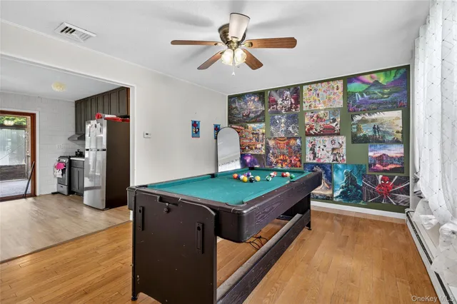 a room with furniture and a large window