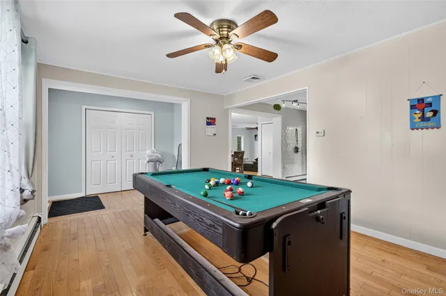 a view of workspace with wooden floor