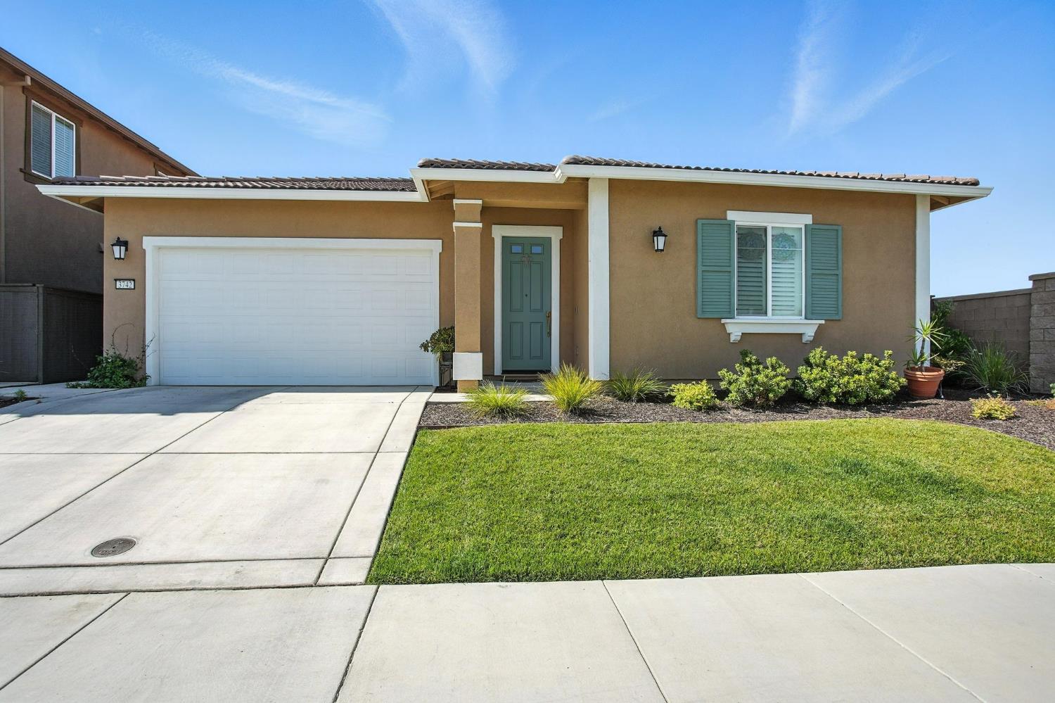 3742 Haymaker Way Sacramento, CA 95835 - Photo 1 of 39 a front view of house with garden
