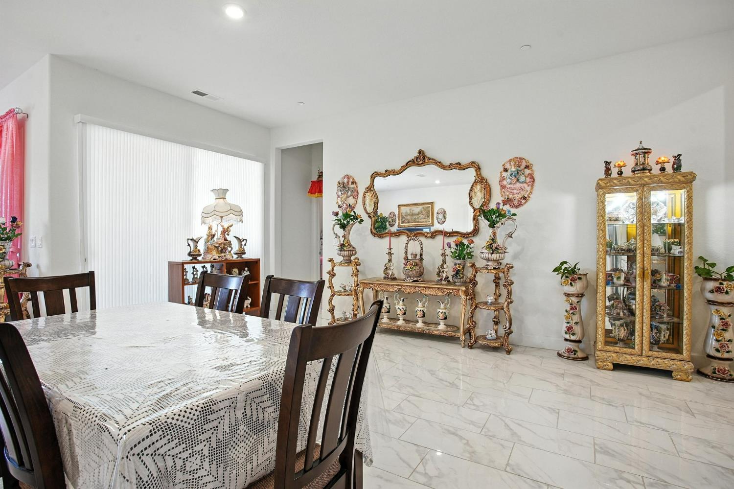 3742 Haymaker Way Sacramento, CA 95835 - Photo 13 of 39 a view of a dining room with furniture