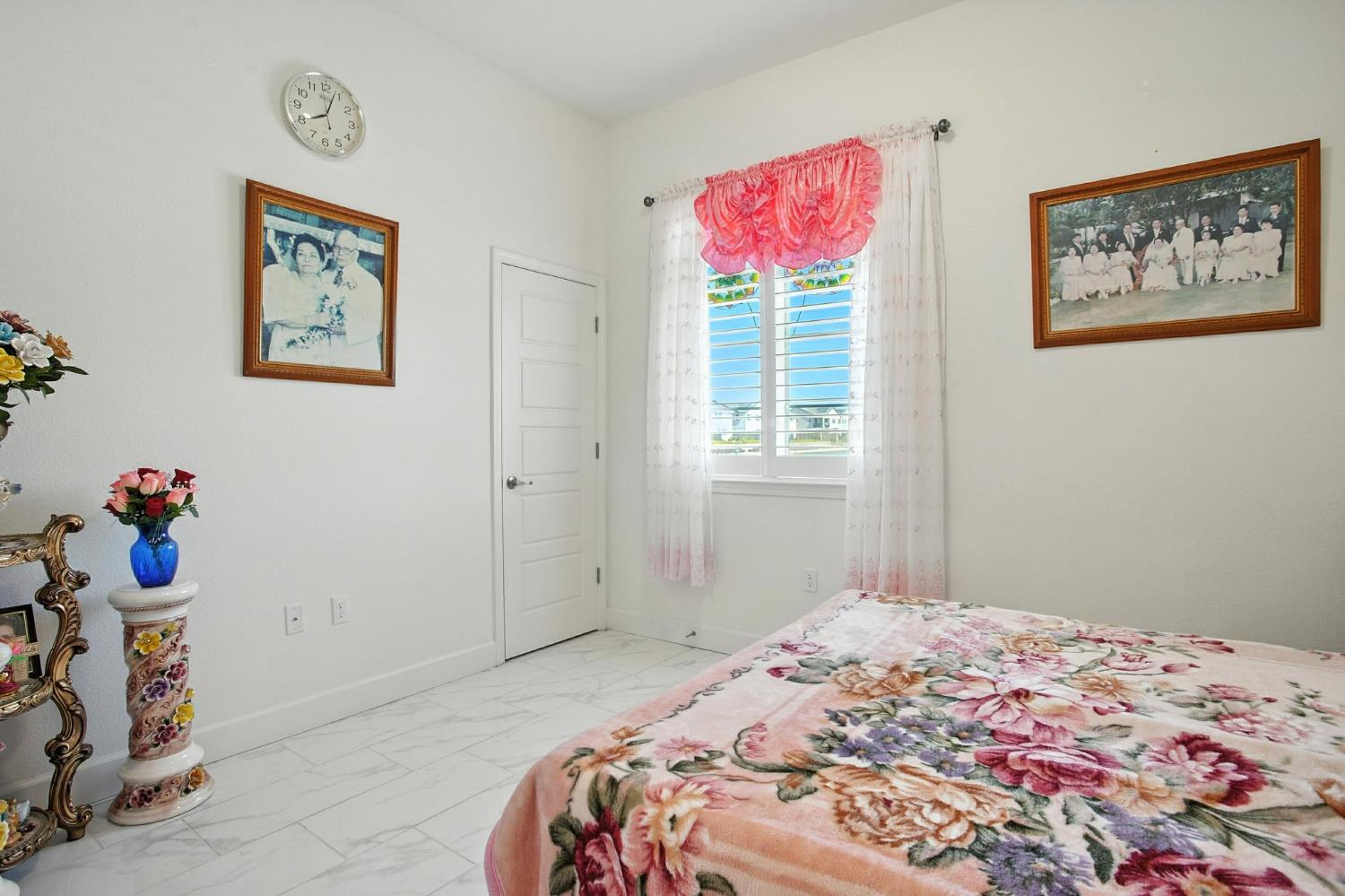 3742 Haymaker Way Sacramento, CA 95835 - Photo 18 of 39 a bedroom with a bed and a window