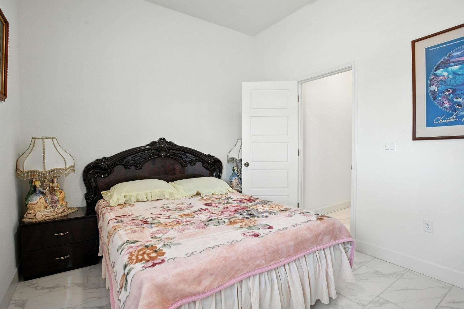 3742 Haymaker Way Sacramento, CA 95835 - Photo 19 of 39 a bedroom with a bed a walk in closet