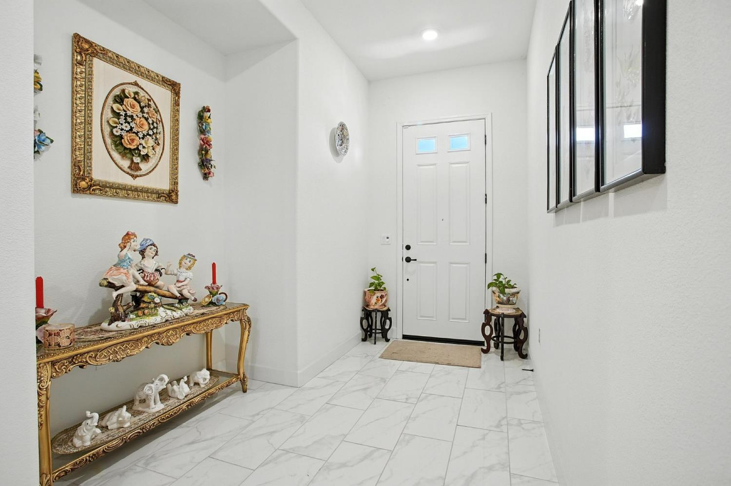 3742 Haymaker Way Sacramento, CA 95835 - Photo 5 of 39 a view of room with painting on the wall