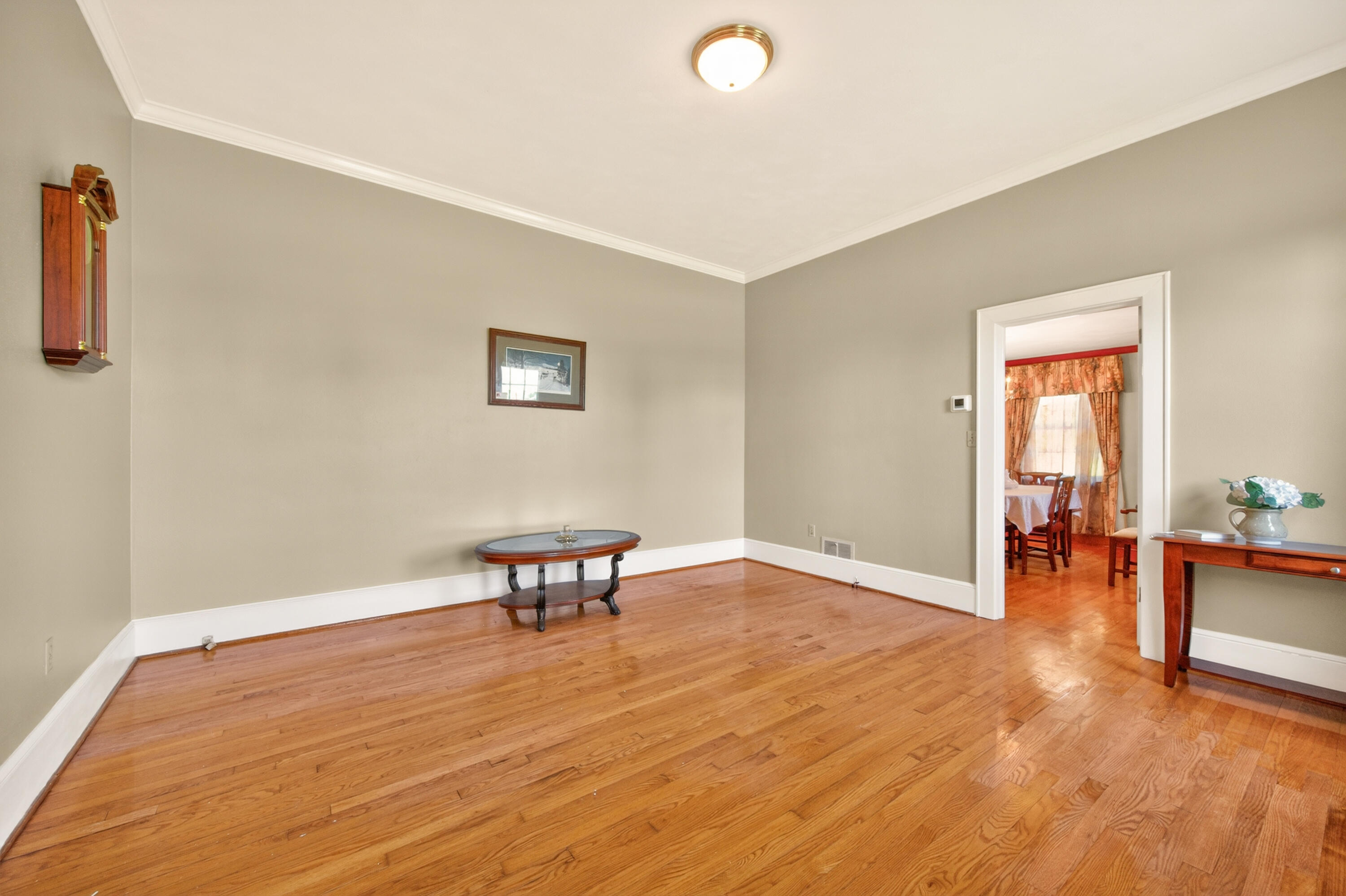 4322 Rosecrest Road Roanoke, VA 24018 - Photo 17 of 36 a view of an empty room with window and wooden floor
