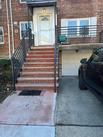 a view of a hardwood floor and a window in the back yard