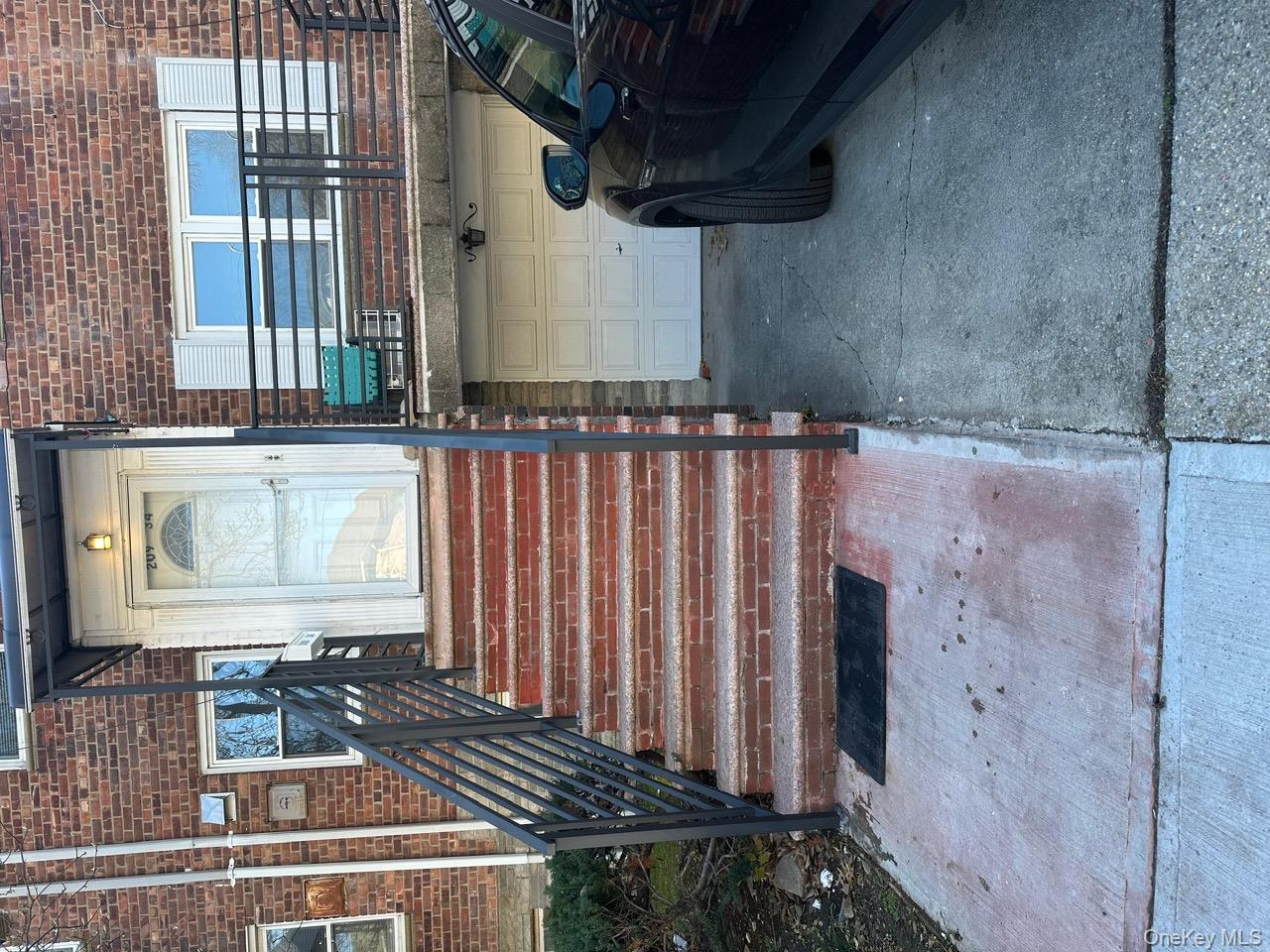a view of a hardwood floor and a window in the back yard